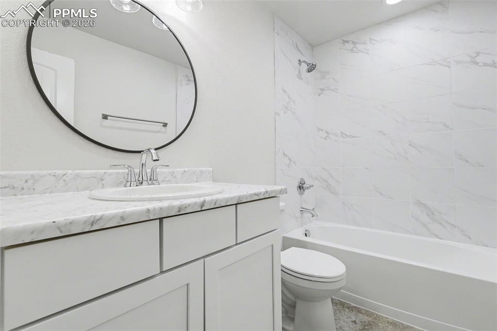 Image 24 of 30: Basement bathroom