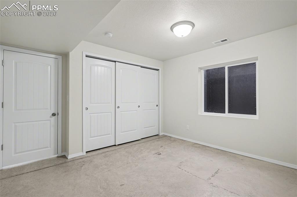 Image 28 of 30: Basement bedroom #4
