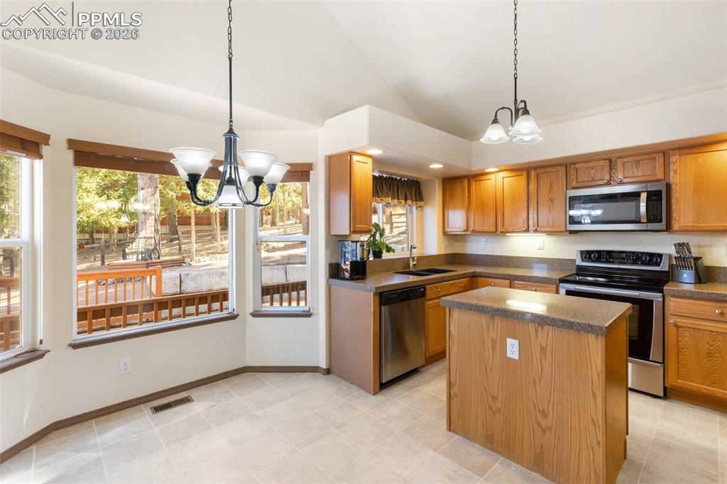 Image 5 of 28: Kitchen / Dining Area