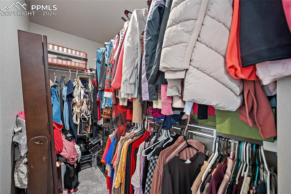 Image 29 of 43: Walk in closet