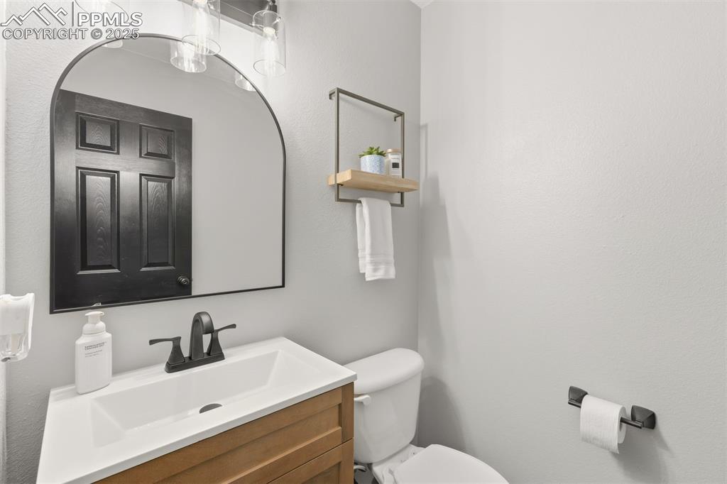 Image 15 of 46: Main level Powder room.