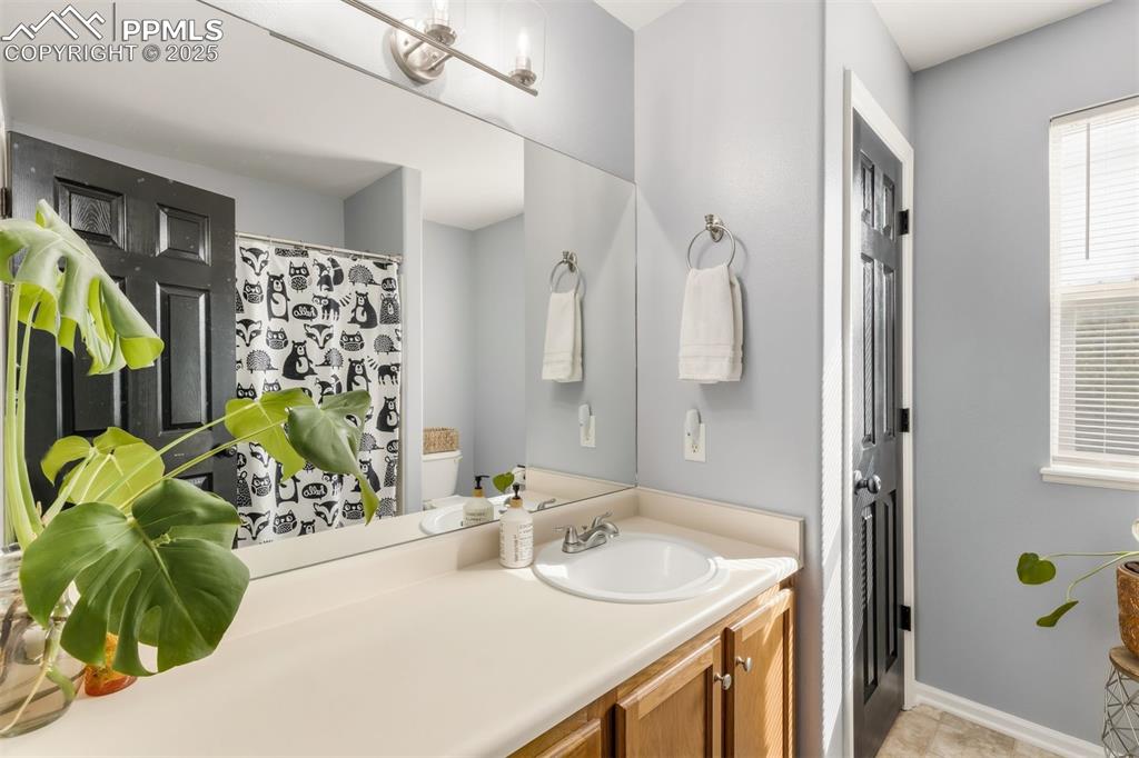 Image 25 of 46: Hallway bath upstairs with a tub/shower.