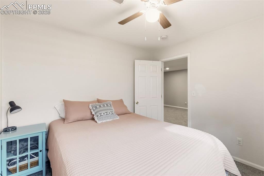 Image 30 of 46: Bedroom #6 is located in the basement.