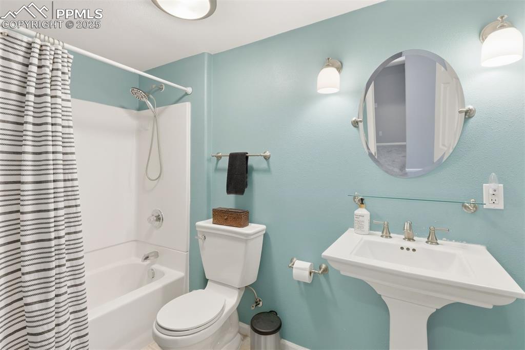 Image 32 of 46: Bathroom #4 is located in the basement.