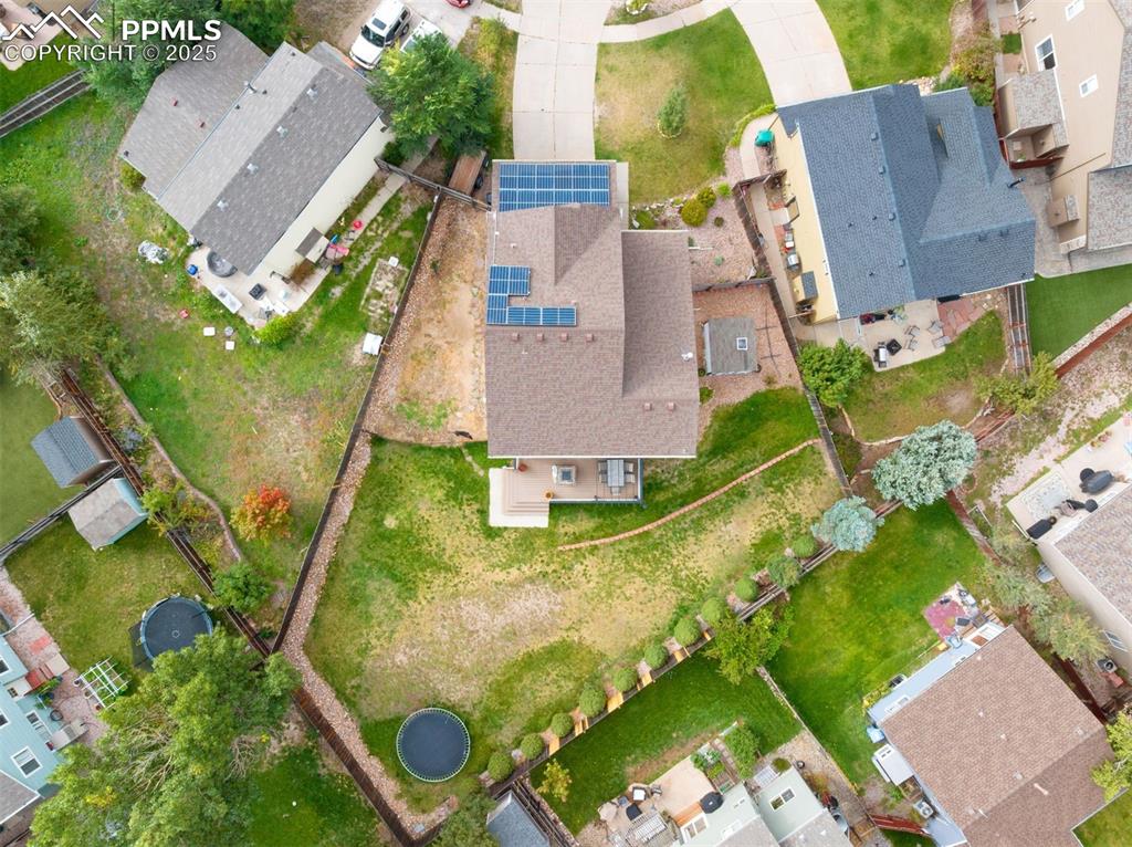 Image 38 of 46: Huge lot on a cul de sac with a dog run on the side of the garage. 