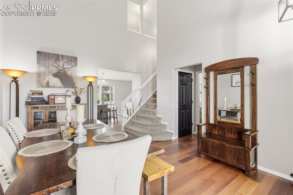 Image 4 of 46: Light & airy Dining area with vaulted ceilings.