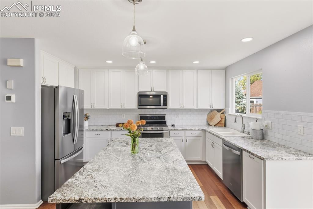 Image 6 of 46: Gas range for the chef of the house. 