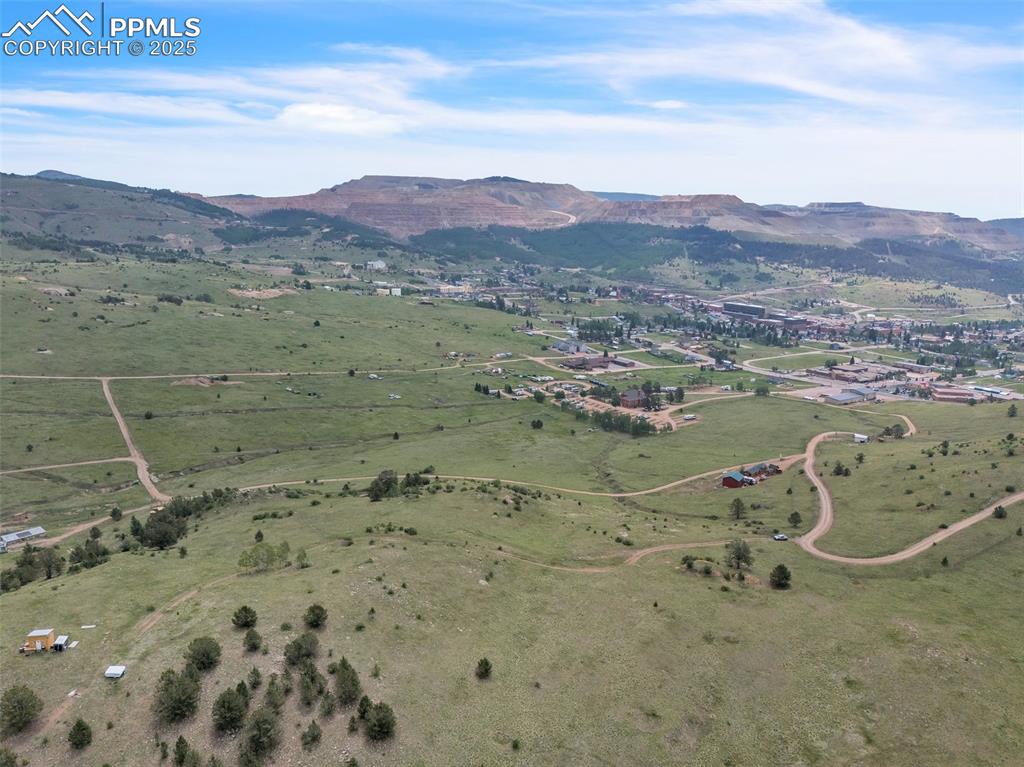 Image 7 of 9: View of property location featuring mountains and rural landscape
