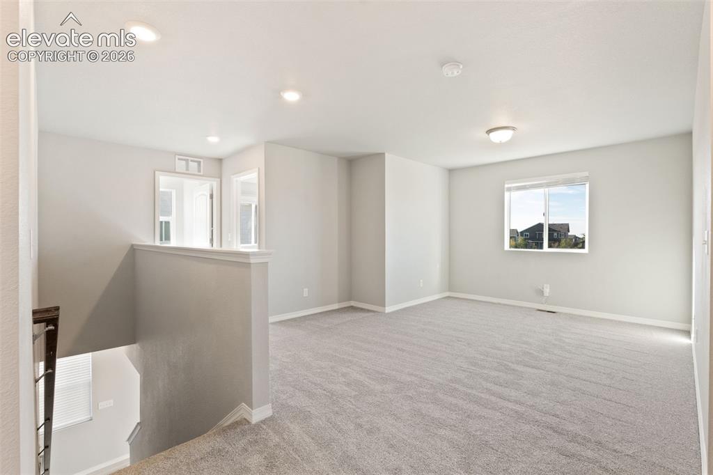 Image 10 of 26: Spacious Loft on upper level