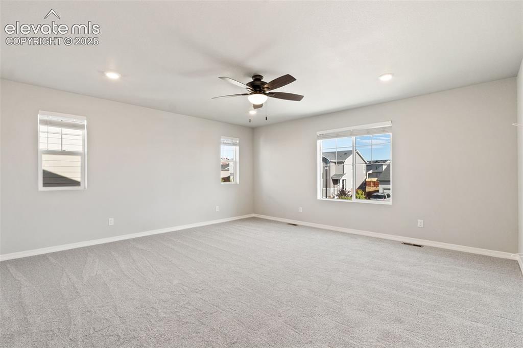 Image 11 of 26: Primary master suite