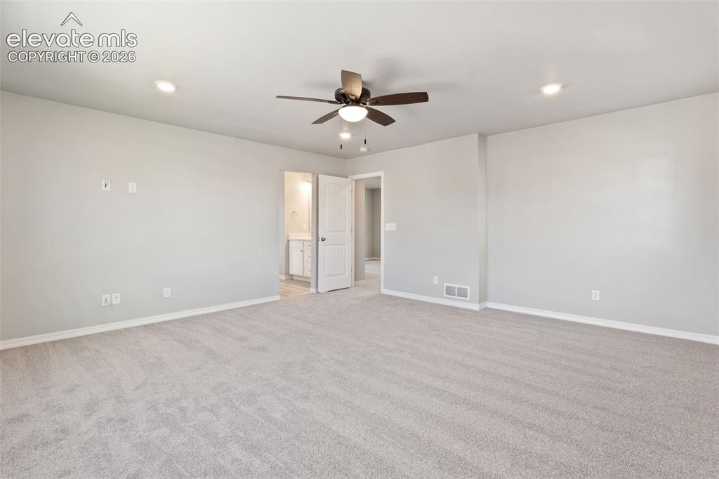 Image 12 of 26: Another angle of the primary master suite