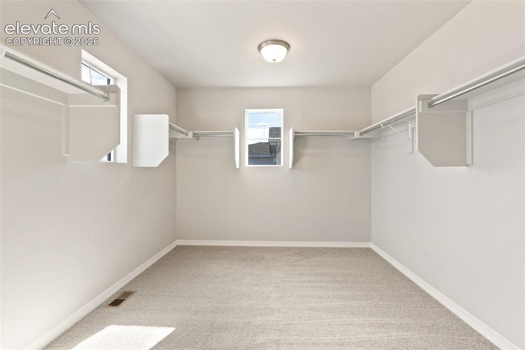 Image 15 of 26: Primary master closet