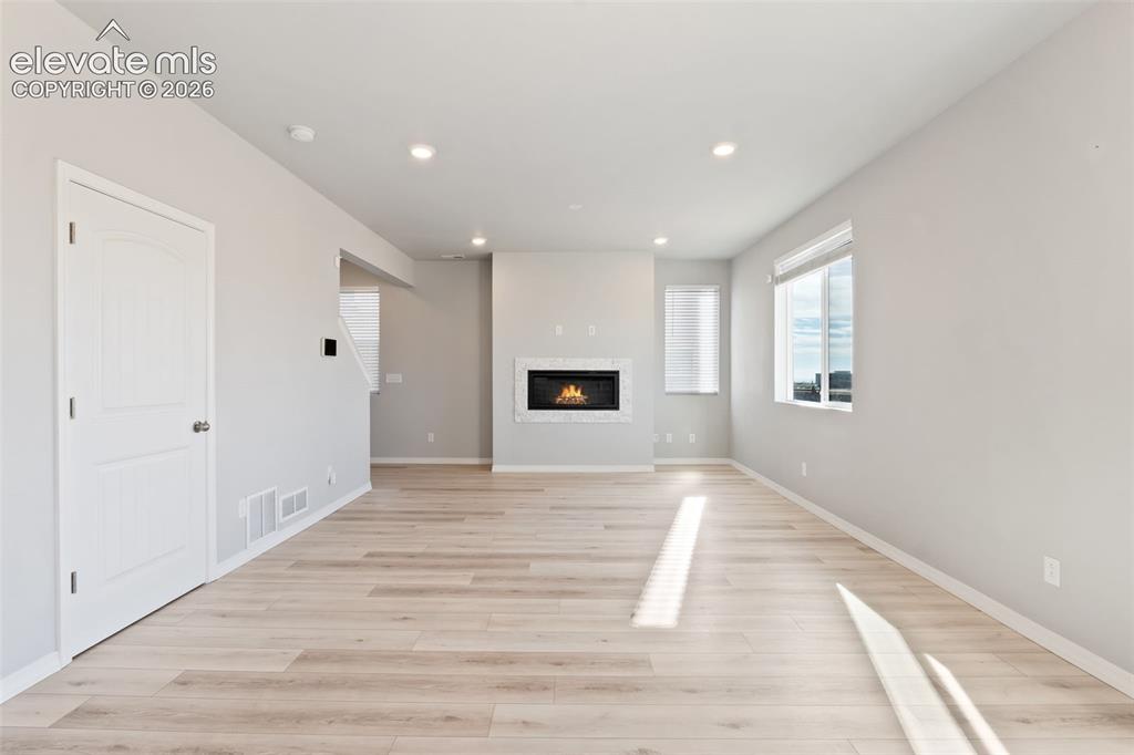 Image 2 of 26: Great Room with fireplace
