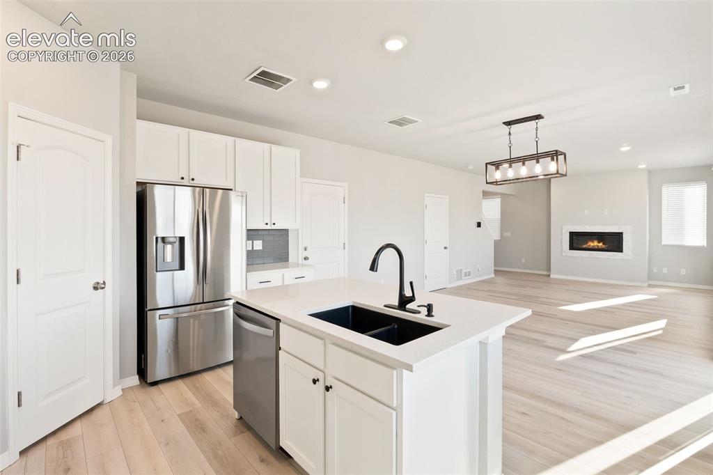 Image 7 of 26: Kitchen with French door refrigerator