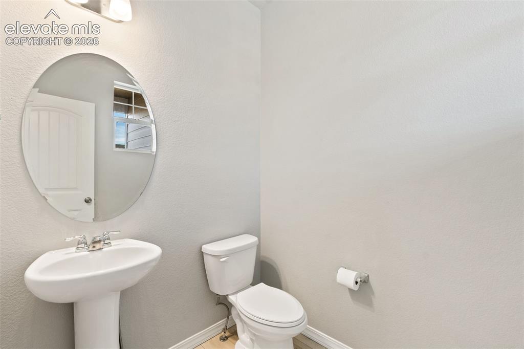 Image 9 of 26: Half bath on main level