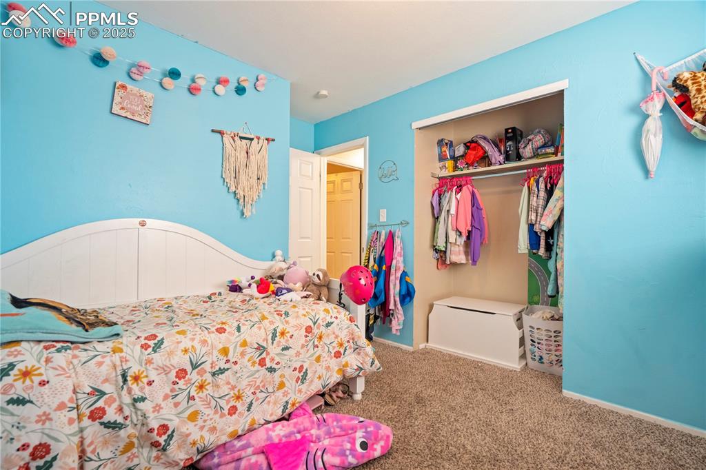 Image 18 of 22: Bedroom featuring carpet and a closet