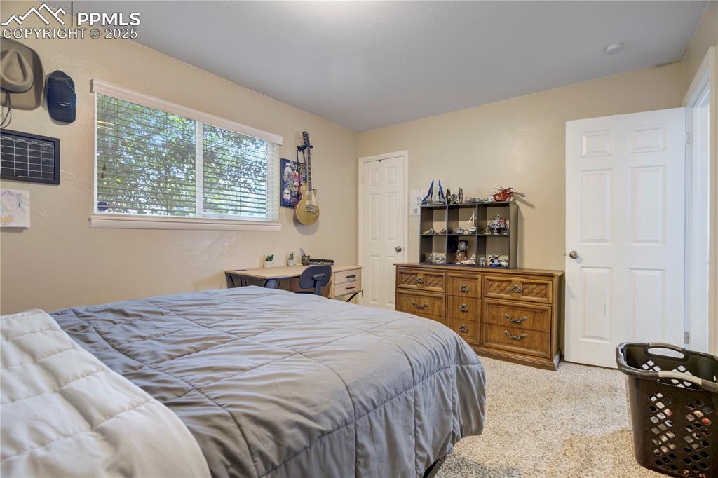 Image 20 of 22: Bedroom featuring carpet floors