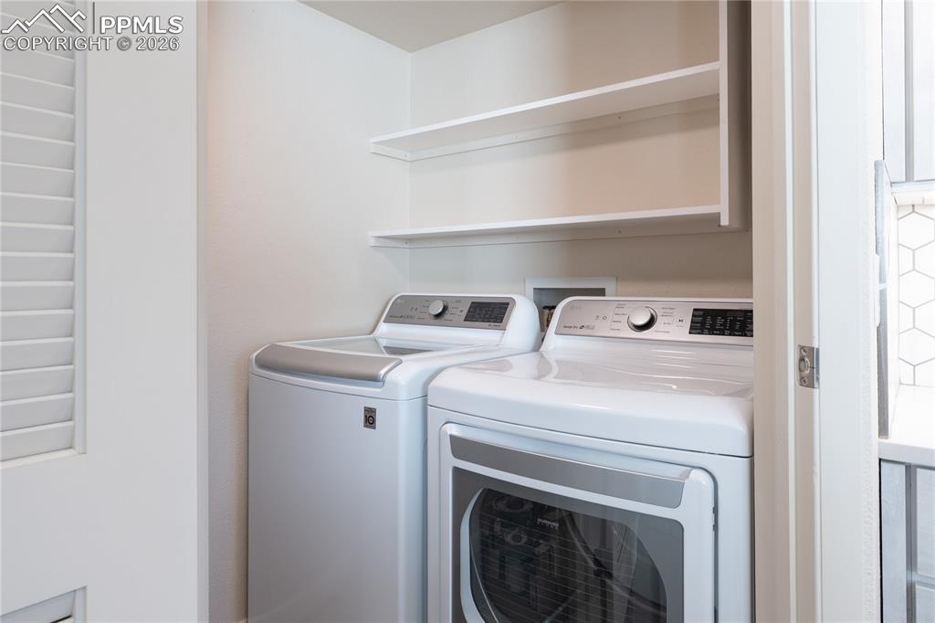 Image 9 of 32: Laundry Room & Pantry Shelving (not pictured...opposite side from the washe