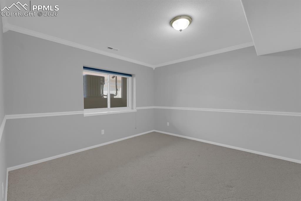 Image 30 of 43: Bedroom 2 in basement level