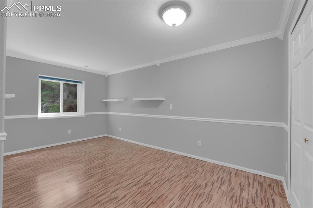 Image 33 of 43: Bedroom 3 in basement level