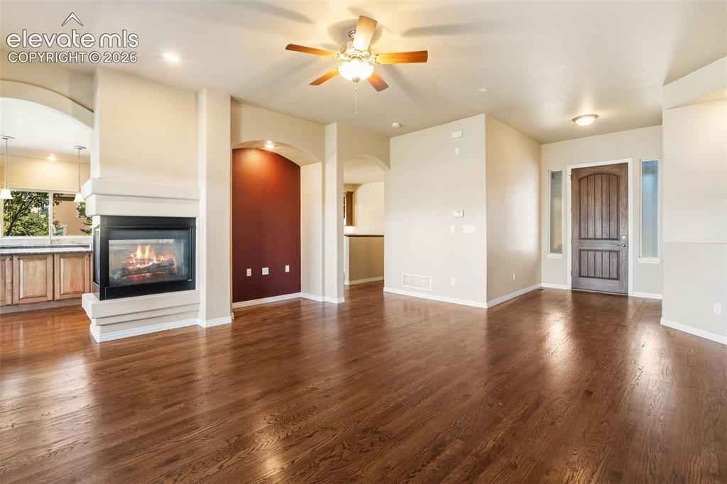 Image 11 of 50: LIVING ROOM WITH FIREPLACE