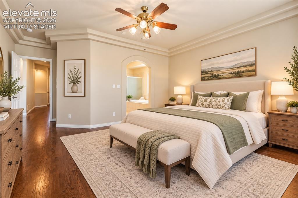 Image 16 of 50: VIRTUALLY STAGED - PRIMARY BEDROOM SUITE