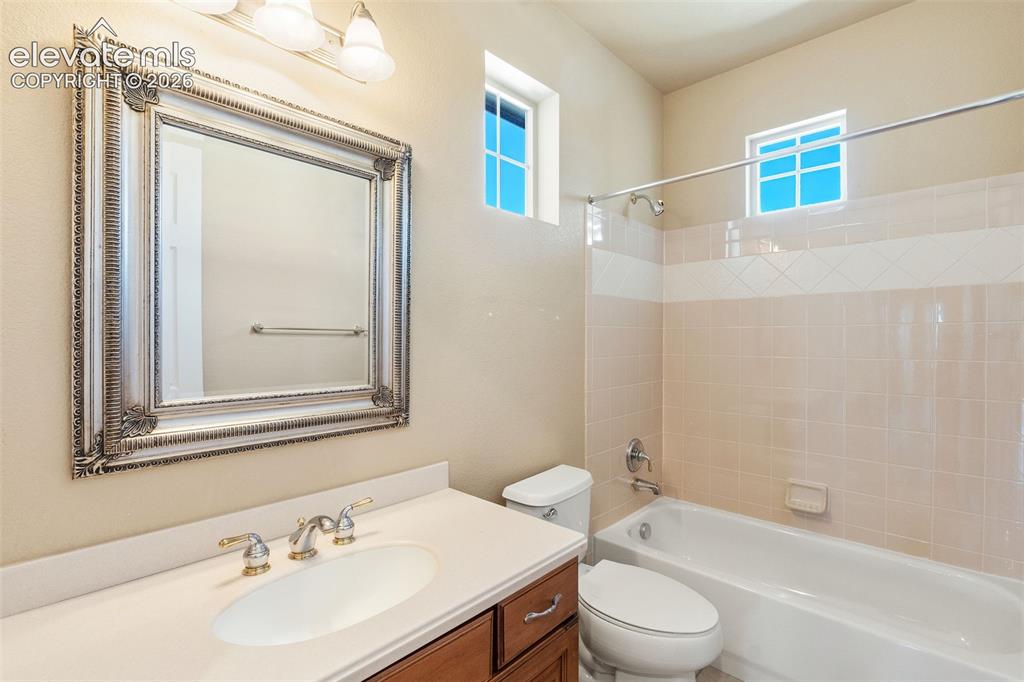 Image 28 of 50: FULL BATHROOM ON MAIN FLOOR WITH TUB/SHOWER AND ACCENTS WINDOWS