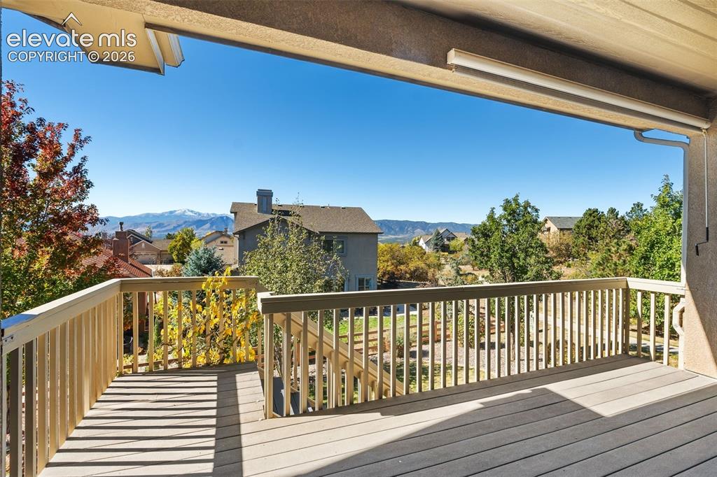 Image 3 of 50: AMAZING VIEWS OF PIKES PEAK AND USAFA FROM THE COVERED DECK
