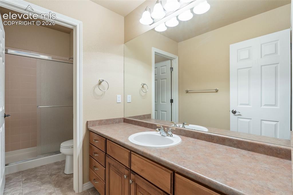 Image 35 of 50: FULL BATHROOM IN BASEMENT