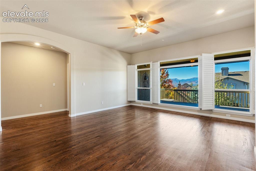Image 9 of 50: LIVING ROOM WITH AMAZING VIEWS OF PIKES PEAK