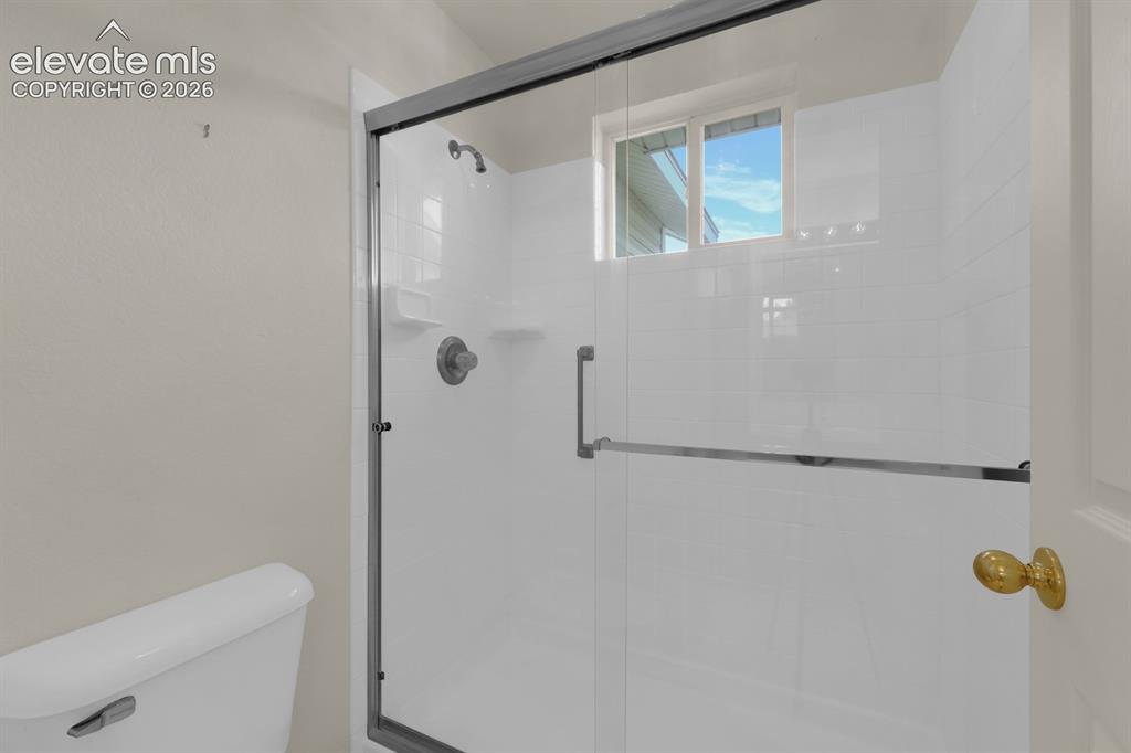 Image 16 of 30: Primary bathroom