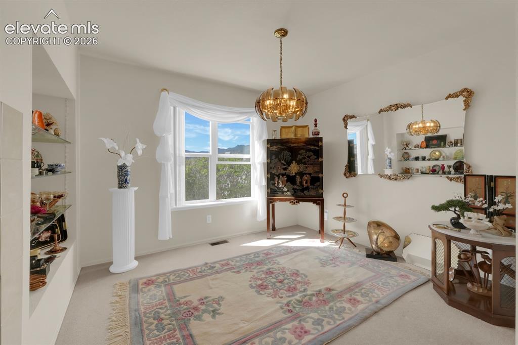 Image 4 of 30: Formal dining or flex space