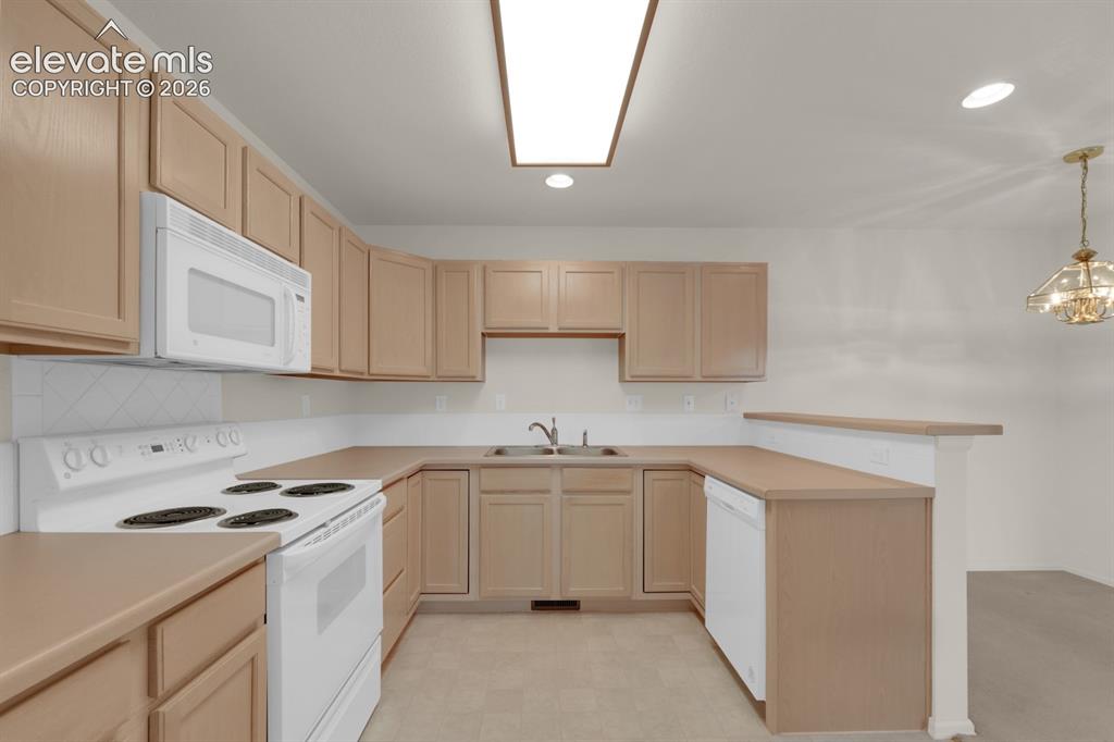 Image 5 of 30: Kitchen with matching appliances