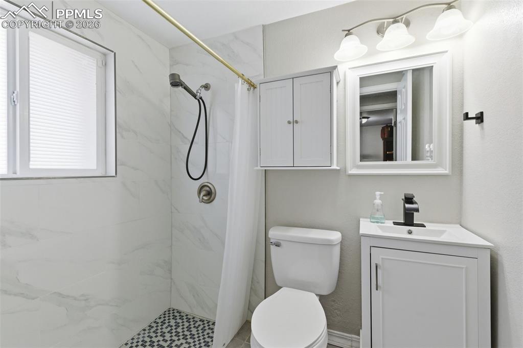 Image 30 of 50: Lower Level Bathroom