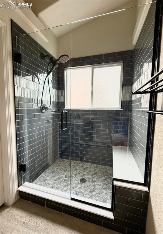 Image 15 of 37: Full bathroom with a shower stall