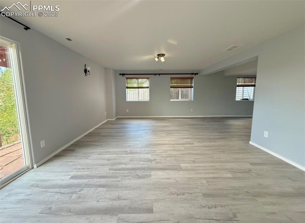 Image 27 of 37: Unfurnished room featuring light wood-style floors