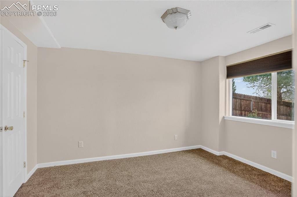 Image 20 of 24: Bedroom 4 - lower level