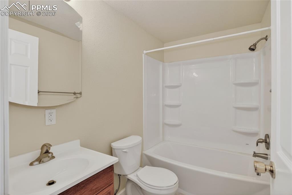 Image 21 of 24: Full guest bath - lower level