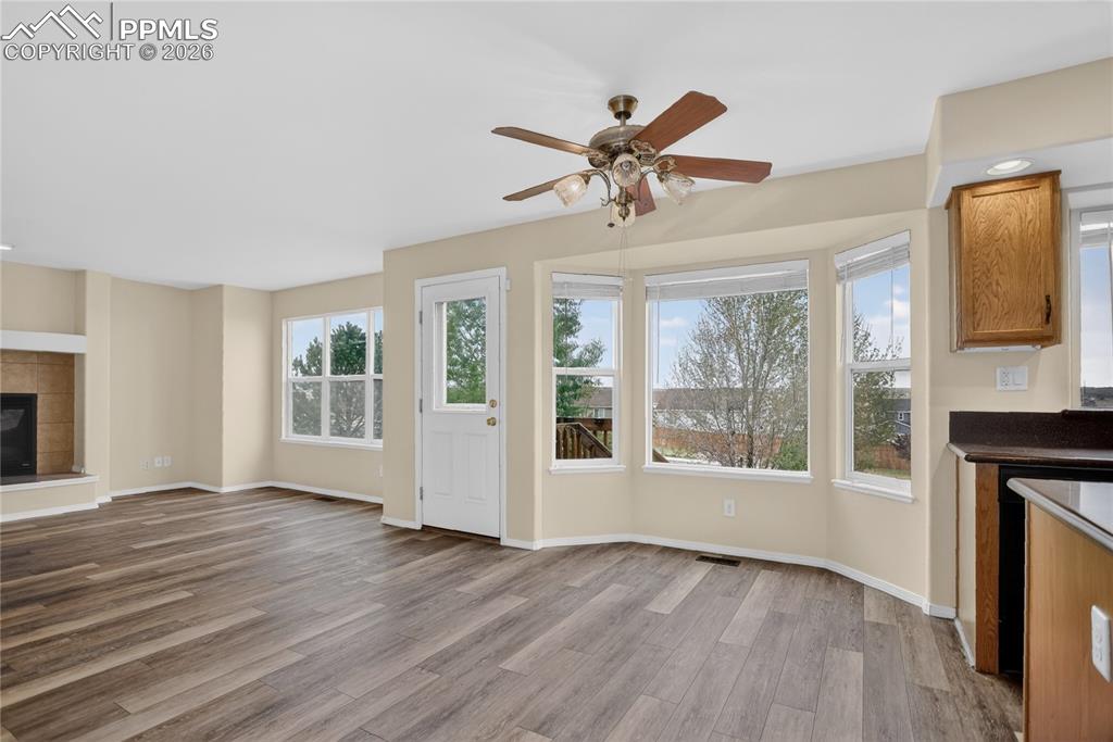 Image 6 of 24: Dining nook & walk-out to deck