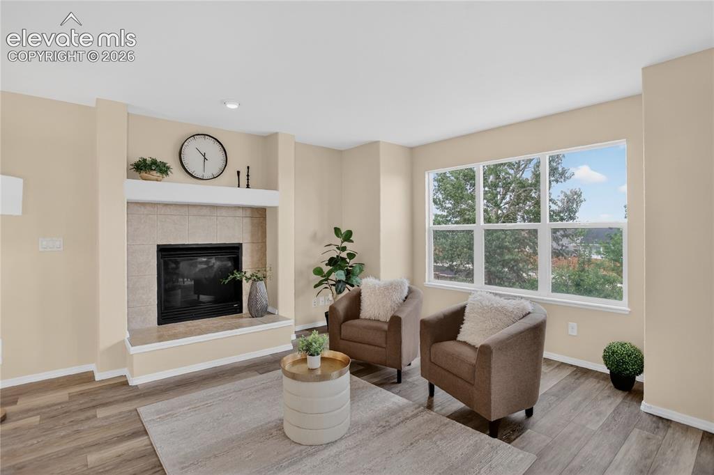Image 8 of 24: Family room w/ fireplace - main level