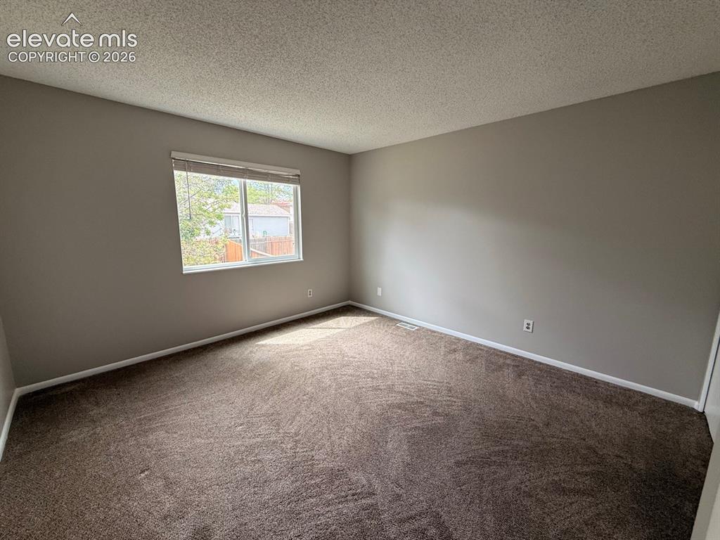 Image 12 of 33: Master Bedroom