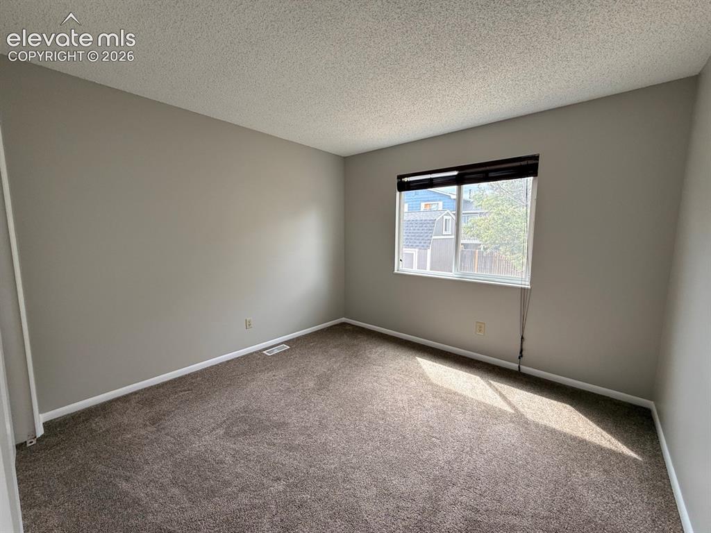 Image 15 of 33: Bedroom