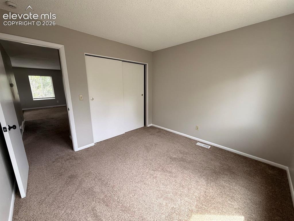 Image 16 of 33: Bedroom
