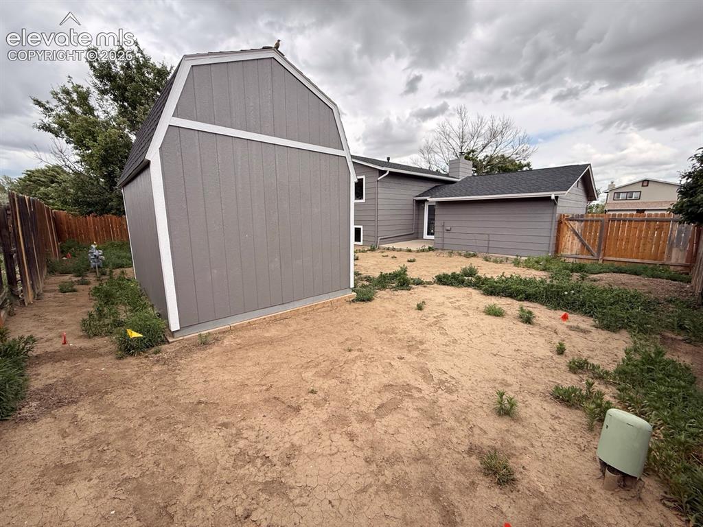 Image 32 of 33: Yard and Tuff Shed