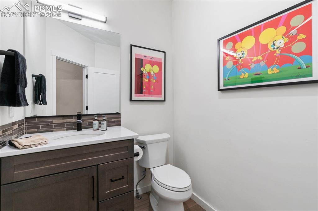 Image 23 of 50: Main level 1/2 bath