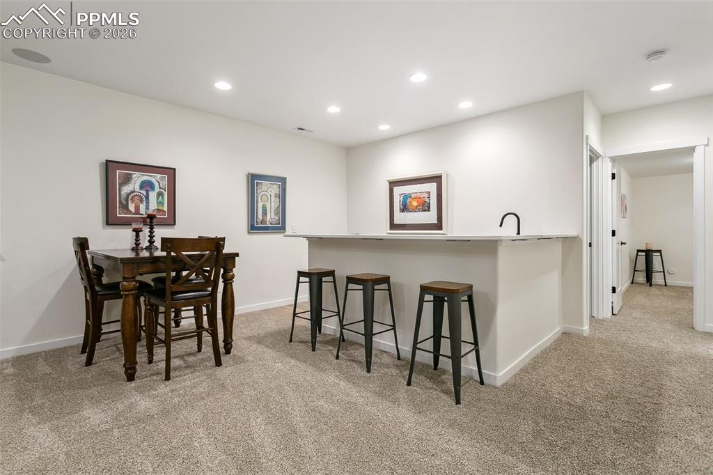 Image 38 of 50: Basement wet bar