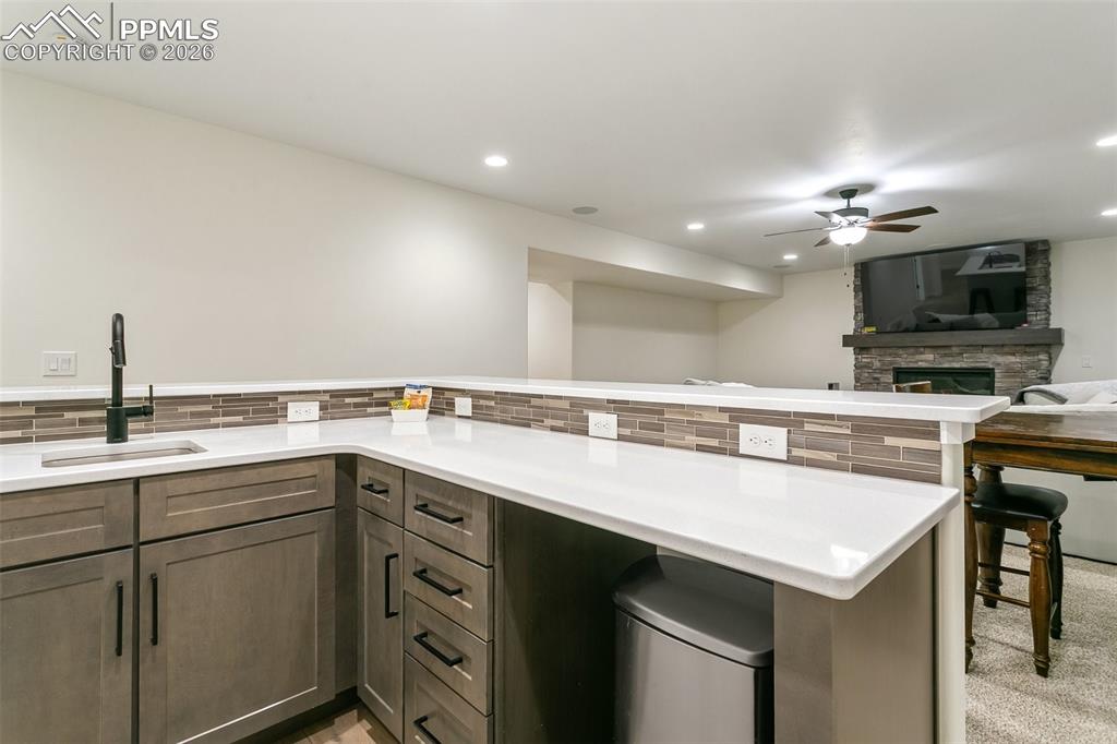 Image 39 of 50: Basement wet bar