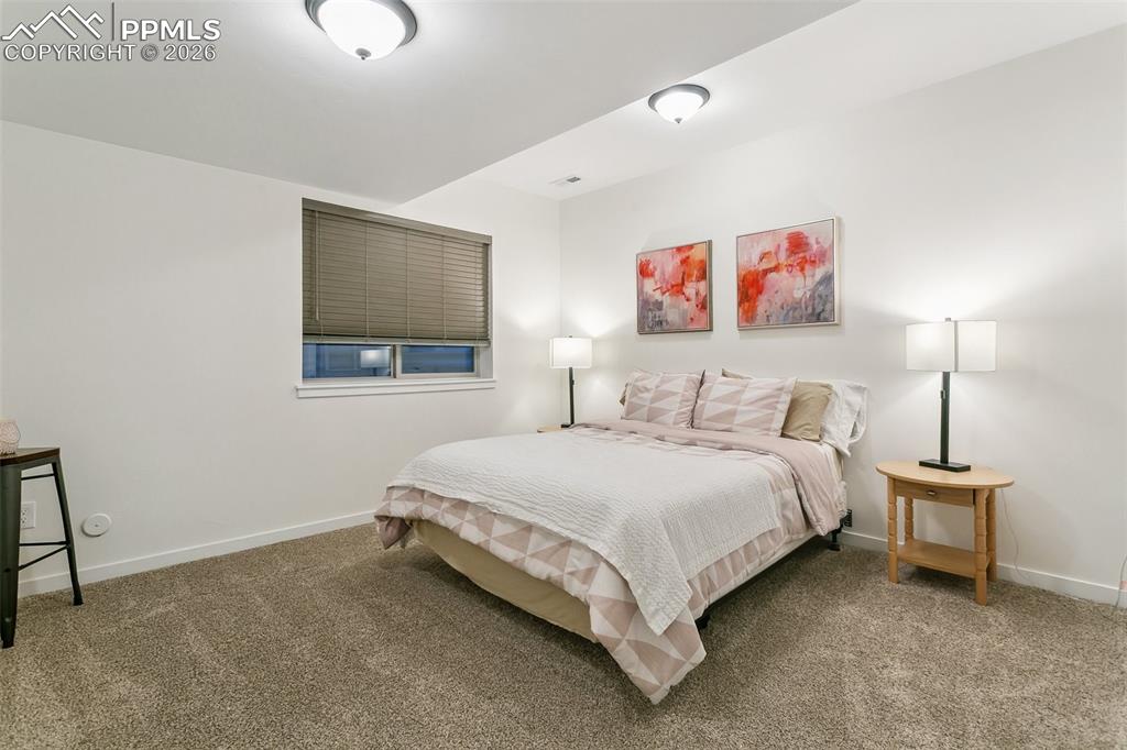 Image 41 of 50: Basement bedroom