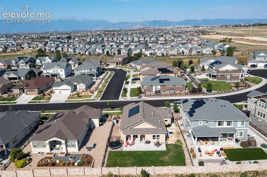 Image 42 of 43: Expansive neighborhood featuring numerous detached residences with varied a