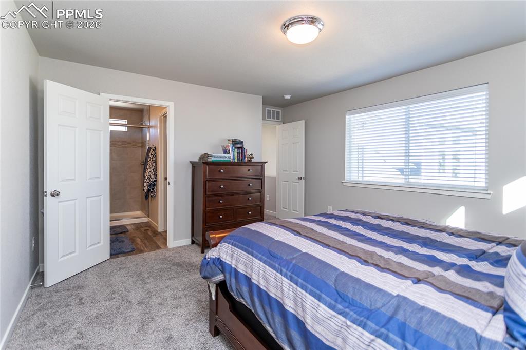 Image 27 of 34: Master Bedroom